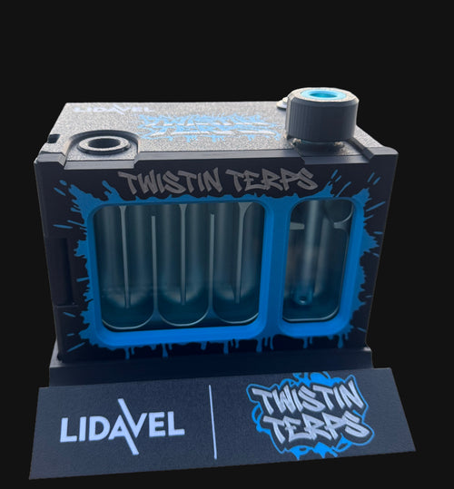 The Box V2 — TwistinTerps × Lidavel Artist Series, custom blue and black finish with original TwistinTerps graffiti artwork, shown on a dark studio background