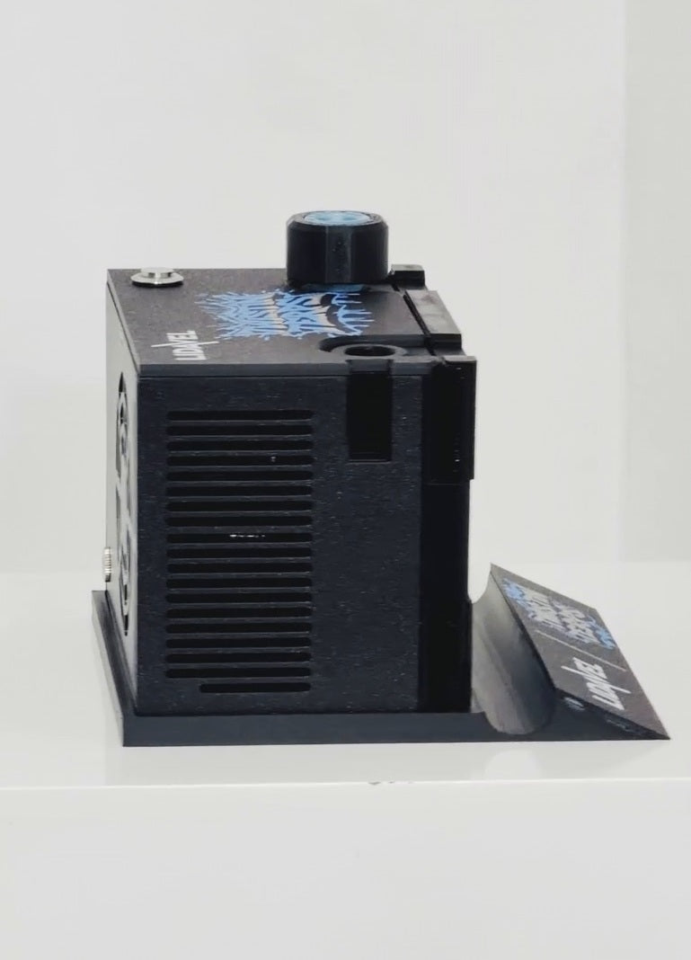 The Box V2 — TwistinTerps × Lidavel, side view showing the ventilation slots and top dial